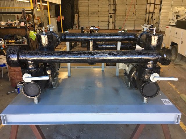 IMG_0741 Two used Bell & Gossett 15HP Pumps skid mounted with Suction Diffusers, Isolation Valves, and Supply and Return Headers